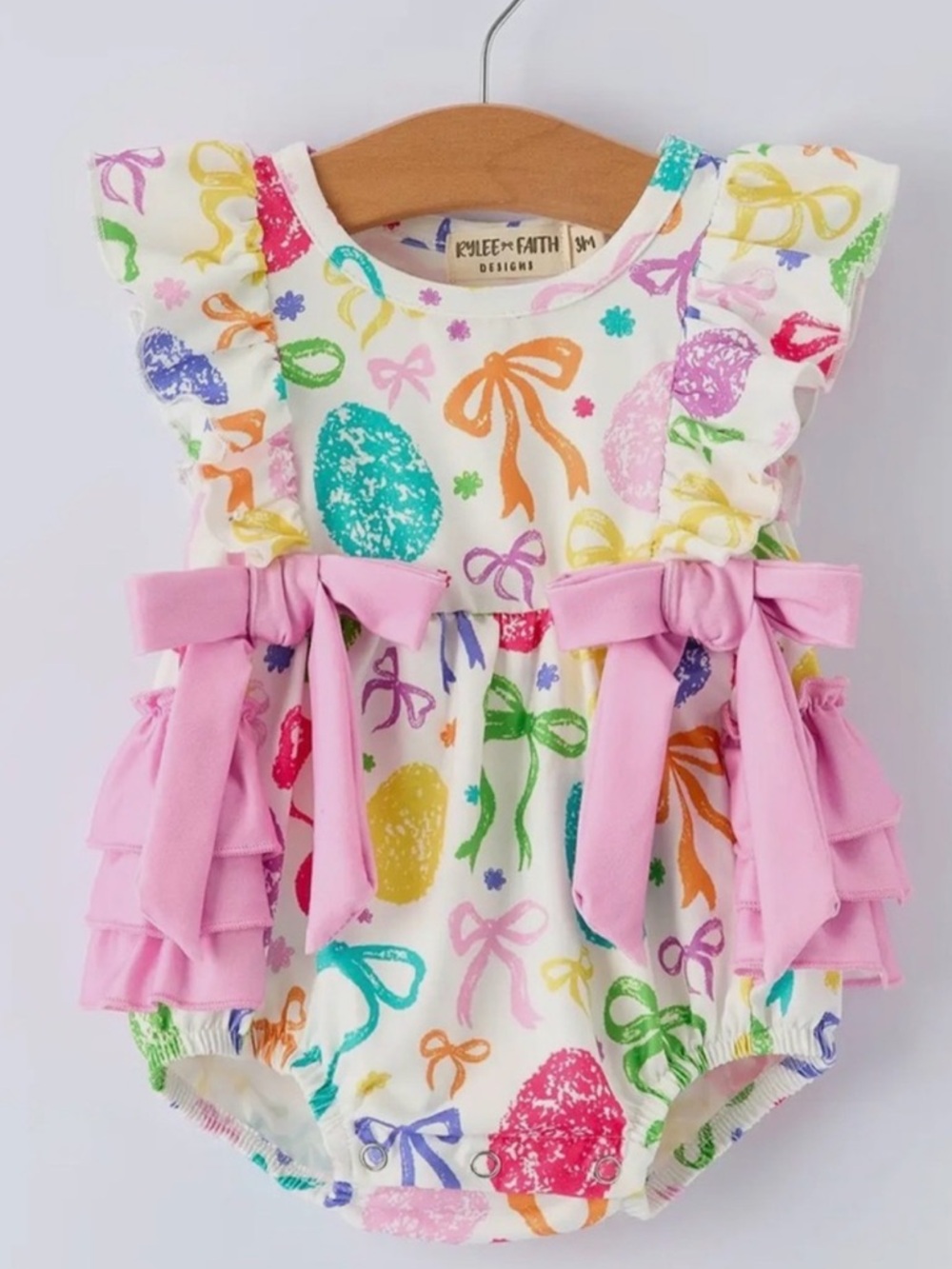 Rylee Faith Designs Easter Colorful Bow Print Baby Romper with Pink Ruffled Bows